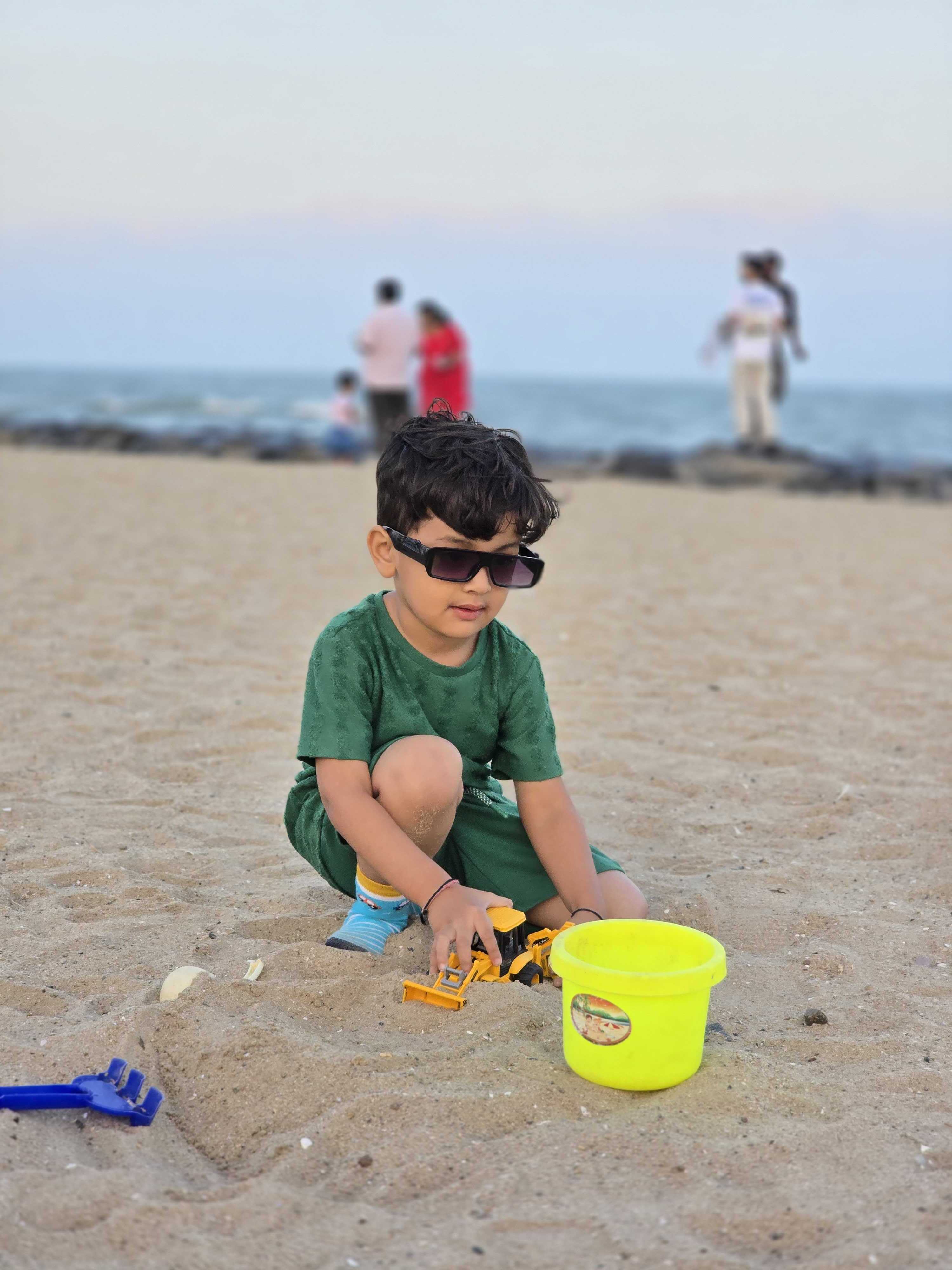 Akshar playing at beach